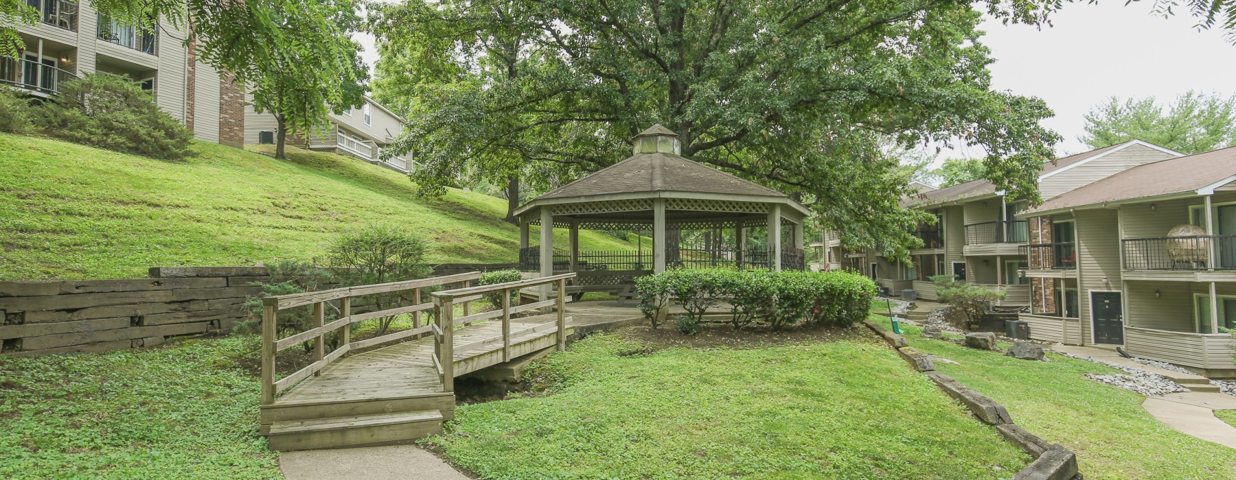 Gazebo with walkway surrounded by trees